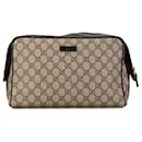 Pochette Gucci GG Supreme marrone