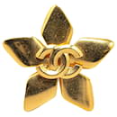 Broche étoile CC dorée Chanel