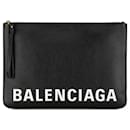 Pochette Balenciaga en cuir noir avec logo Ville