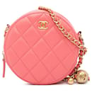 Bolso de mano redondo con diseño de perlas y piel de cordero acolchado Chanel CC en color rosa con bolso bandolera con cadena