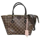 Bolsa Louis Vuitton Damier Ebene Caissa PM Marrom Marrom