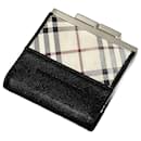 Porta-moedas de couro Burberry Nova Check em muito bom estado