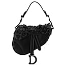 Silla de montar Dior mini de piel de cordero negra con apliques florales