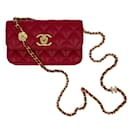 Sac à rabat en cuir caviar matelassé WOC Camellia Rouge - Chanel