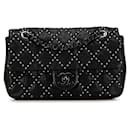 Chanel Medium Quilted Leather Studded Flap Bag Leather Shoulder Bag in Good condition