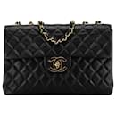 Bolso de hombro Chanel Maxi XL clásico de piel de cordero con solapa única negro