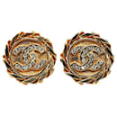 Boucles d'oreilles clip CC strass plaqué or doré Chanel