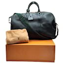 Bolsa Keepall Boston em couro Taiga Louis Vuitton Kendall