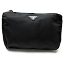 PRADA CLUTCH BLACK RE-NYLON CANVAS TOILETRIES POUCH CLUTCH BAG - Prada