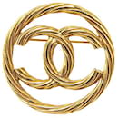 Broche Chanel Coco Mark chapada en oro en muy buen estado