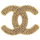 Broche vintage Chanel Coco Mark plaquée or en très bon état