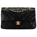 Rabat doublé en cuir d'agneau classique moyen noir Chanel