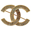 Spilla vintage Chanel Coco Mark con strass placcata in oro in ottime condizioni