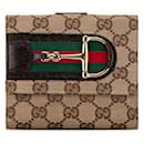 Portafoglio bifold Gucci GG Canvas Horsebit 138031 in pelle marrone in ottime condizioni