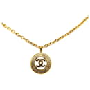 Colar medalha vintage Coco Mark da Chanel banhado a ouro em muito bom estado