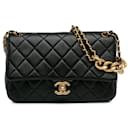 Sac classique en cuir d'agneau matelassé noir Chanel avec chaîne en cuir.