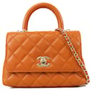 Bolso de mano Coco Top Handle Extra Mini Caviar Naranja Chanel