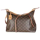 Bolsa de viagem MM em lona Monogram Louis Vuitton