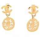 VINTAGE BOUCLES D'OREILLES CHANEL LOGO CC AJOURE 1970 METAL DORE GOLDEN EARRINGS - Chanel