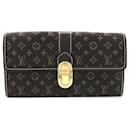 Carteira longa Louis Vuitton Porte Feuille Sarah em lona M63006 em muito bom estado