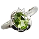 Anello in platino Pt850 con peridoto da 1,13 ct e diamante da 0,07 ct in ottime condizioni - & Other Stories