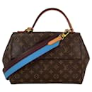 Bolso de hombro con asa superior Monogram Cluny MM Louis Vuitton