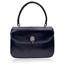 Vintage schwarze Lederhandtasche mit Lapislazuli-Verschluss. - Gucci