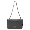 Chanel Noir Jumbo Classique Caviar Double Rabat