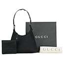 Gucci Mini Nylon Leather Handbag Black in Very Good Condition