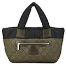 Borsa a mano reversibile in nylon Chanel Coco Mark Cocoon trapuntata a quadri in ottime condizioni