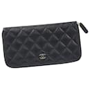 Portefeuille long zippé Chanel en cuir noir