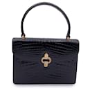 Vintage braune Lederhandtasche mit goldener Verschluss - Gucci