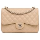 Chanel Brown Jumbo Classic Caviar Double Flap