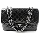 NOVE BOLSA CHANEL GRANDE CLÁSSICA TIMELESS JUMBO MATELASSÉ PRETA - Chanel