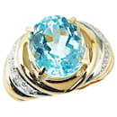 Anillo de oro amarillo K18YG, platino Pt900, topacio azul de 9.99 ct, diamante de 0.10 ct en excelente estado - & Other Stories