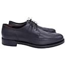 Salvatore Ferragamo Textured Lace-Up Oxfords in Black Leather