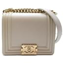 Bolsa transversal Chanel Mini Boy em couro em excelente estado