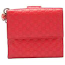 Billetera bifold de cuero Microguccissima de Gucci, billetera corta de cuero 282579 en muy buenas condiciones