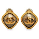 Boucles d'oreilles clip en pierre Coco Mark de Chanel plaquées or en très bon état