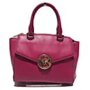 Sac à main en cuir rose choquant Michael Kors en bon état