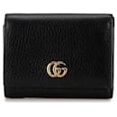 Portefeuille compact trifold en cuir Gucci GG Marmont 474746 en très bon état