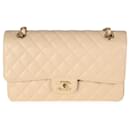 Borsa Chanel in caviar trapuntato beige, modello classico medio con doppio flap