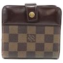 Portefeuille court compact zippé en toile Louis Vuitton N61688 en bon état