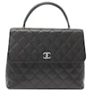 Borsa a mano Kelly in caviar nero di Chanel