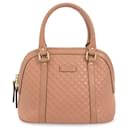 Mini sac à main Dome Microguccissima rose Gucci