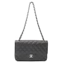 Bolso de Hombro Chanel Jumbo Classic Caviar Doble Solapa Negro