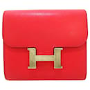 Portefeuille compact Constance en Epsom rouge Hermès