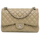 Bolso de hombro Chanel Jumbo Classic Caviar Double Flap beige