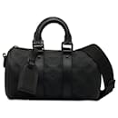 Sac à bandoulière Keepall Bandoulière 25 en Monogram Taurillon noir de Louis Vuitton