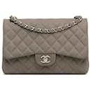 Bolso de hombro Chanel Jumbo Classic Caviar Double Flap gris